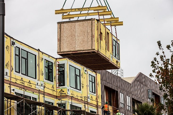 Each of the three modular boxes that make up a suite will connect utilities into the building&rsquo;s common hallway. The first project will be a six-storey, 47-unit residence consisting mostly of middle-income large two and three bedroom suites.