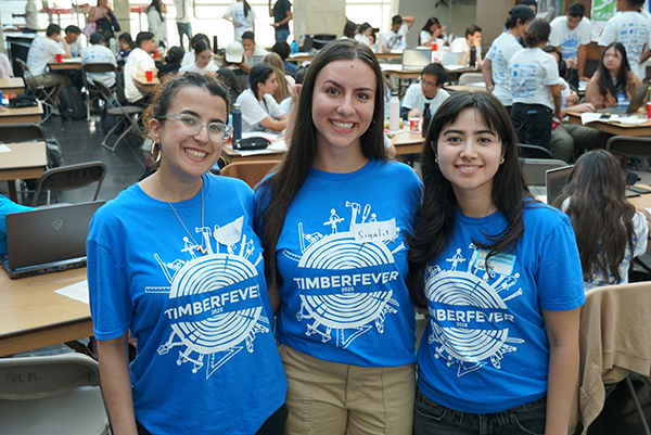 Pictured are committee chairs for TimberFever 2025, from left, Zaina Nafal, Sigalit Tsirulnikov and Giuliana Fonseca-Velazquez.