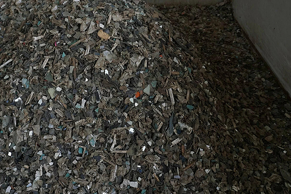 The first step in Weinert&rsquo;s glass recycling process involves separating out impurities like plastics and PVB films.