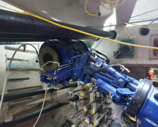 A robotic jack handler was developed to make pre-stressing the steel strands quicker and safer