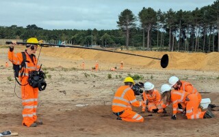 The TV film crew keep tabs on progress [ &copy; Oxford Cotswold Archaeology] 