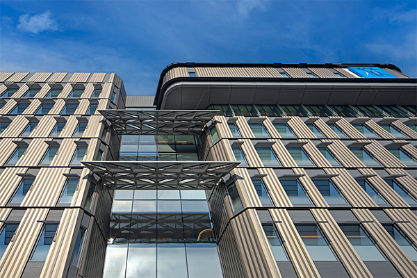 Façade shading on the south side of Hope Plaza in California reduces solar heat gain, while full glazing on the north side maximizes views of the San Gabriel Mountains.