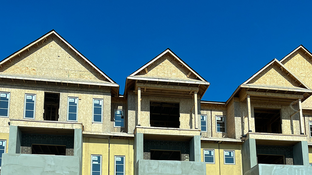 CMHC reports annual rate of housing starts slowed in March