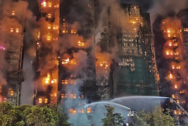Hong Kong charges 7 people and 2 firms over massive fire that killed 168