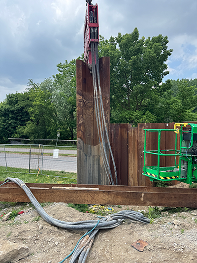 Shown is sheet pile wall installation equipment at the Greenway Wastewater Treatment Plant.