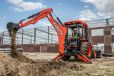 Kubota’s M62 backhoe has a 14-ft. maximum digging depth, a 17-percent improvement over the previous model. (Kubota photo)