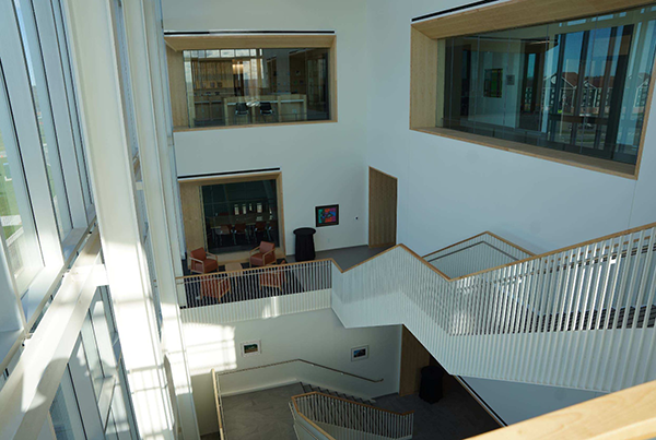 The signature interior staircase highlights the medical school's open light-filled concept.