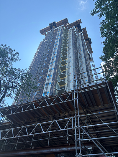 444 Logan under construction with completed exterior and mechanical and electrical works.